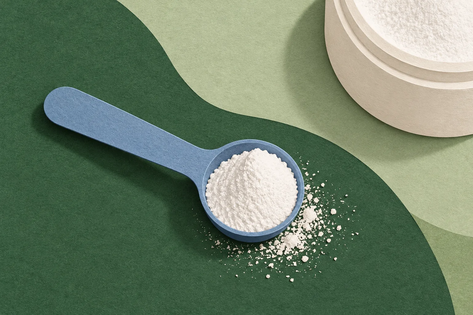 Paper collage of a blue spoon of white powder on layered green paper