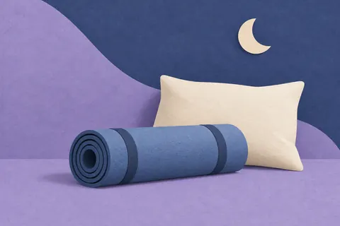 Paper collage of an exercise mat, pillow and crescent moon